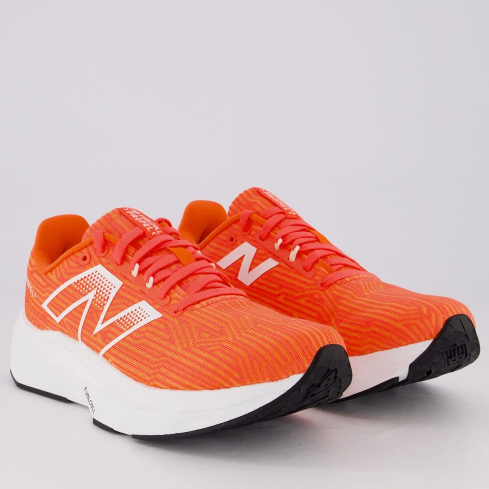 Vista 2 Tênis New Balance Fuelcell Propel V5 Feminino Coral New Balance laranja coral