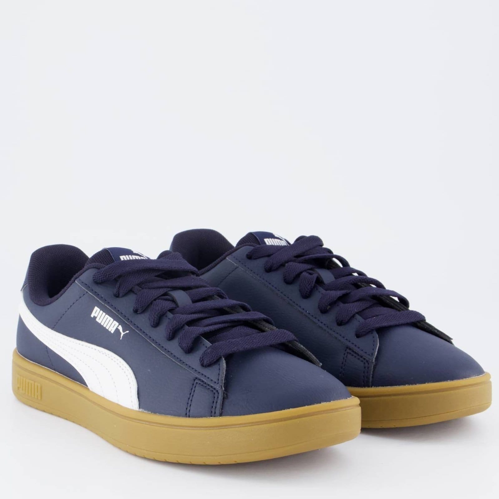 Vista 2 Tênis Puma Rickie Classic Juvenil Azul e Branco Puma azul marinho