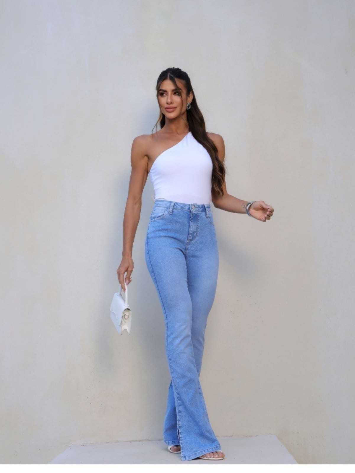 Vista principal Calça Jeans Crawling Feminina Bootcut Cintura Alta Claro Crawling azul