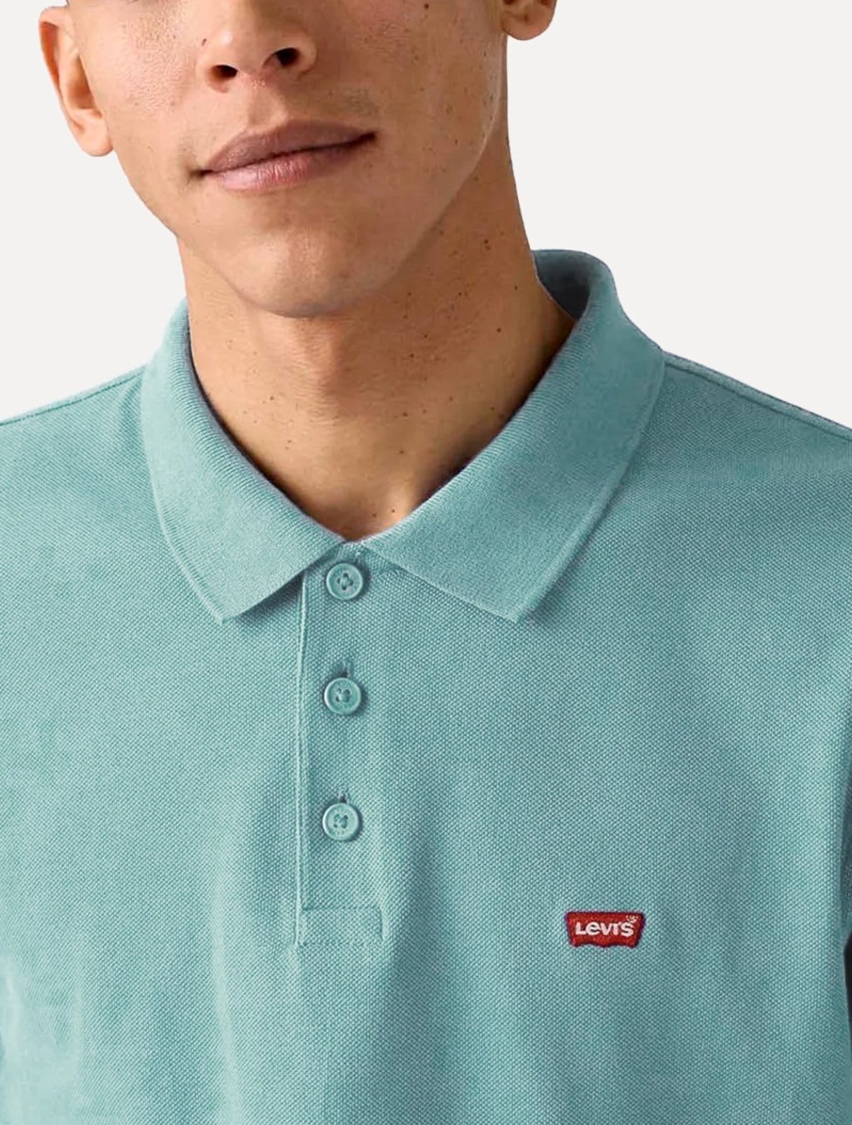 Vista 2 Polo Levis Masculina Housemark Turquesa Levis azul