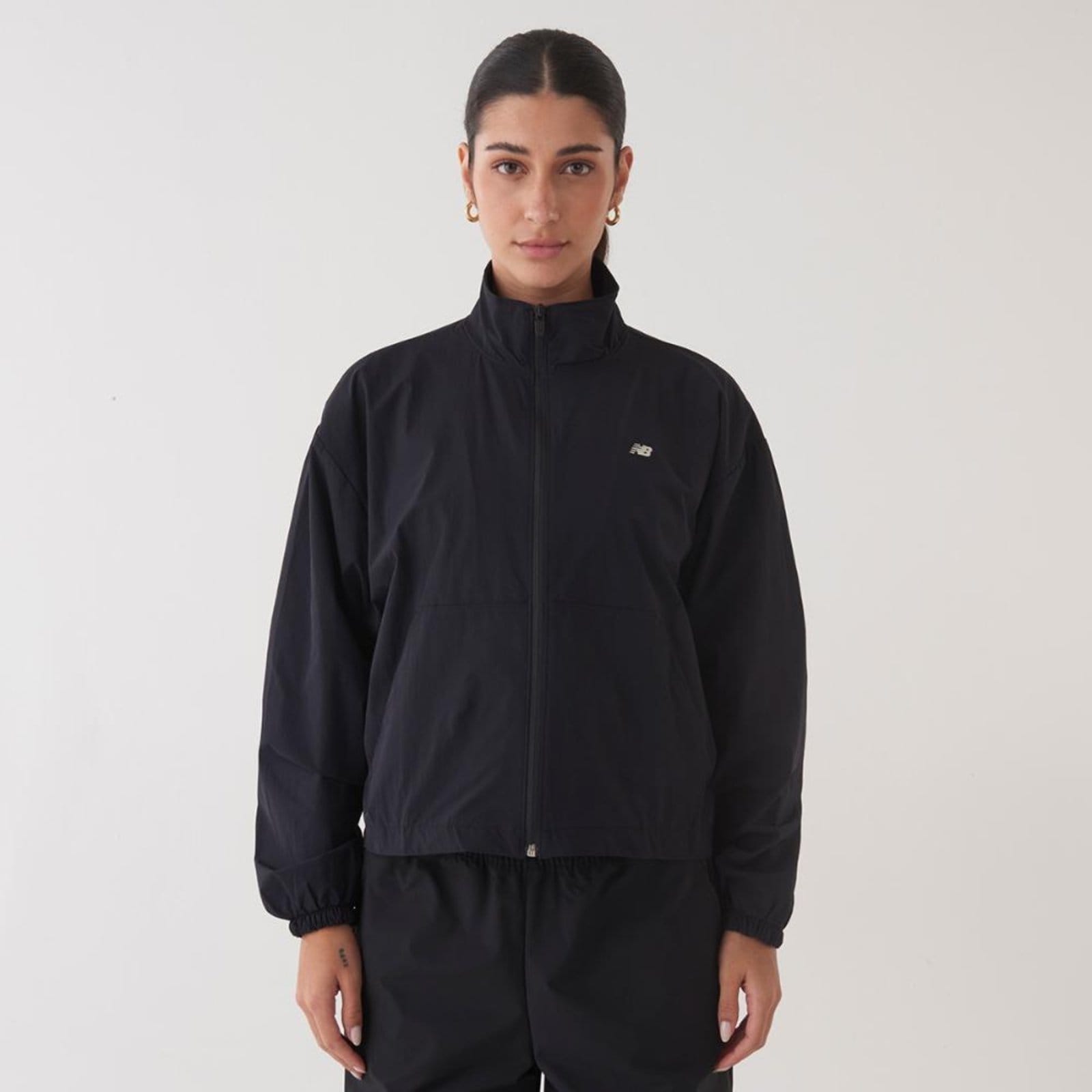 Vista principal Jaqueta Small Logo Feminina New Balance incolor