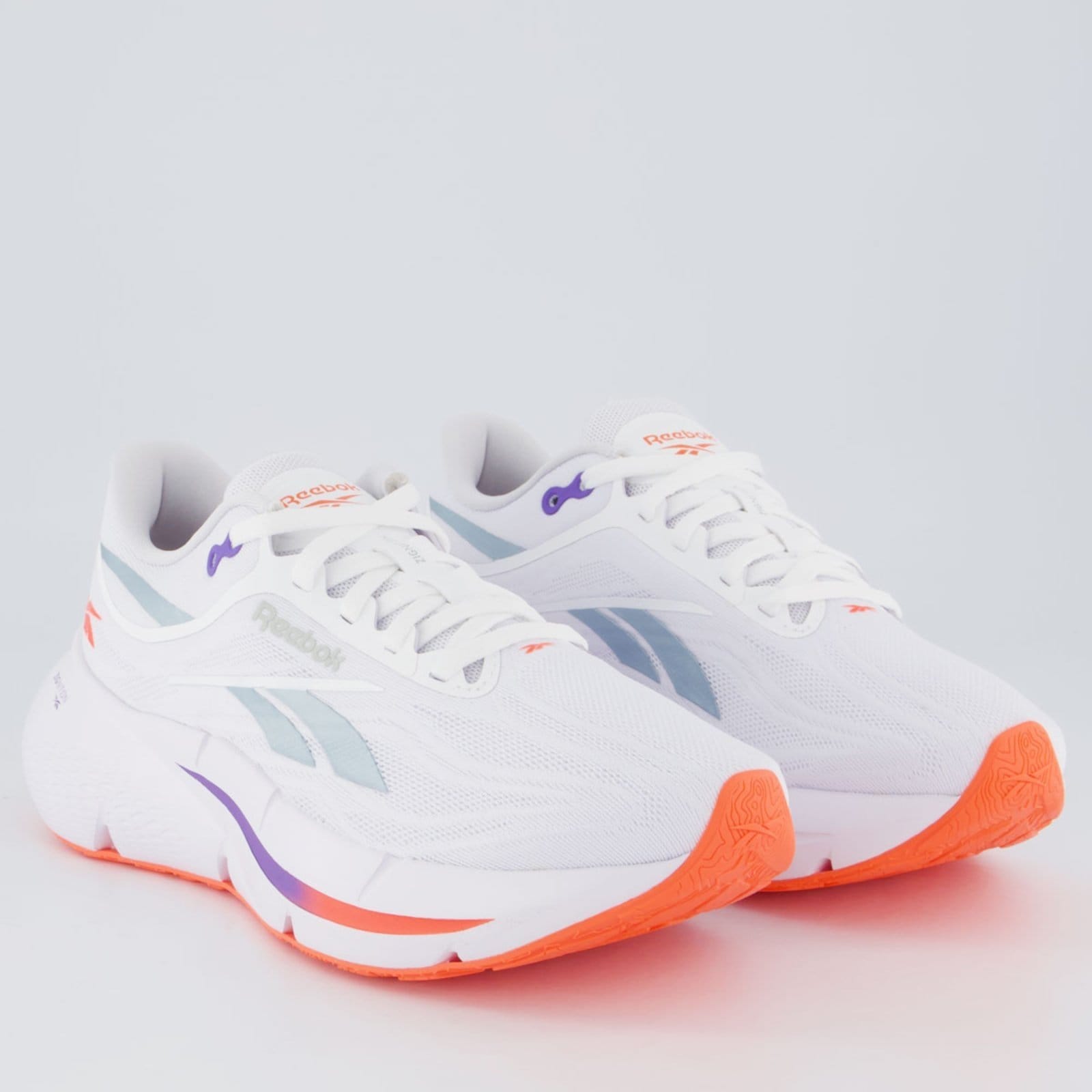 Vista 2 Tênis Reebok Zignition Feminino e Laranja Reebok branco