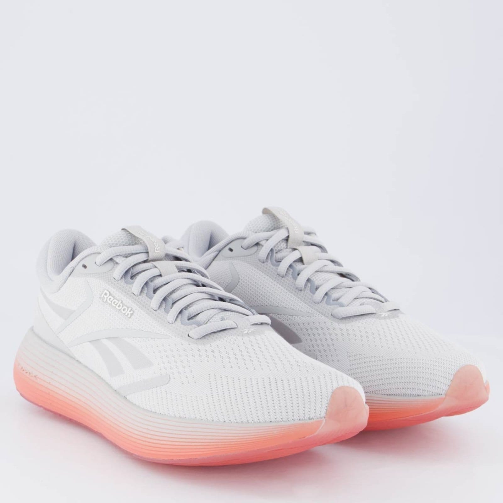 Vista 2 Tênis Reebok DMX Comfort 2.0 Feminino e Lara Reebok cinza