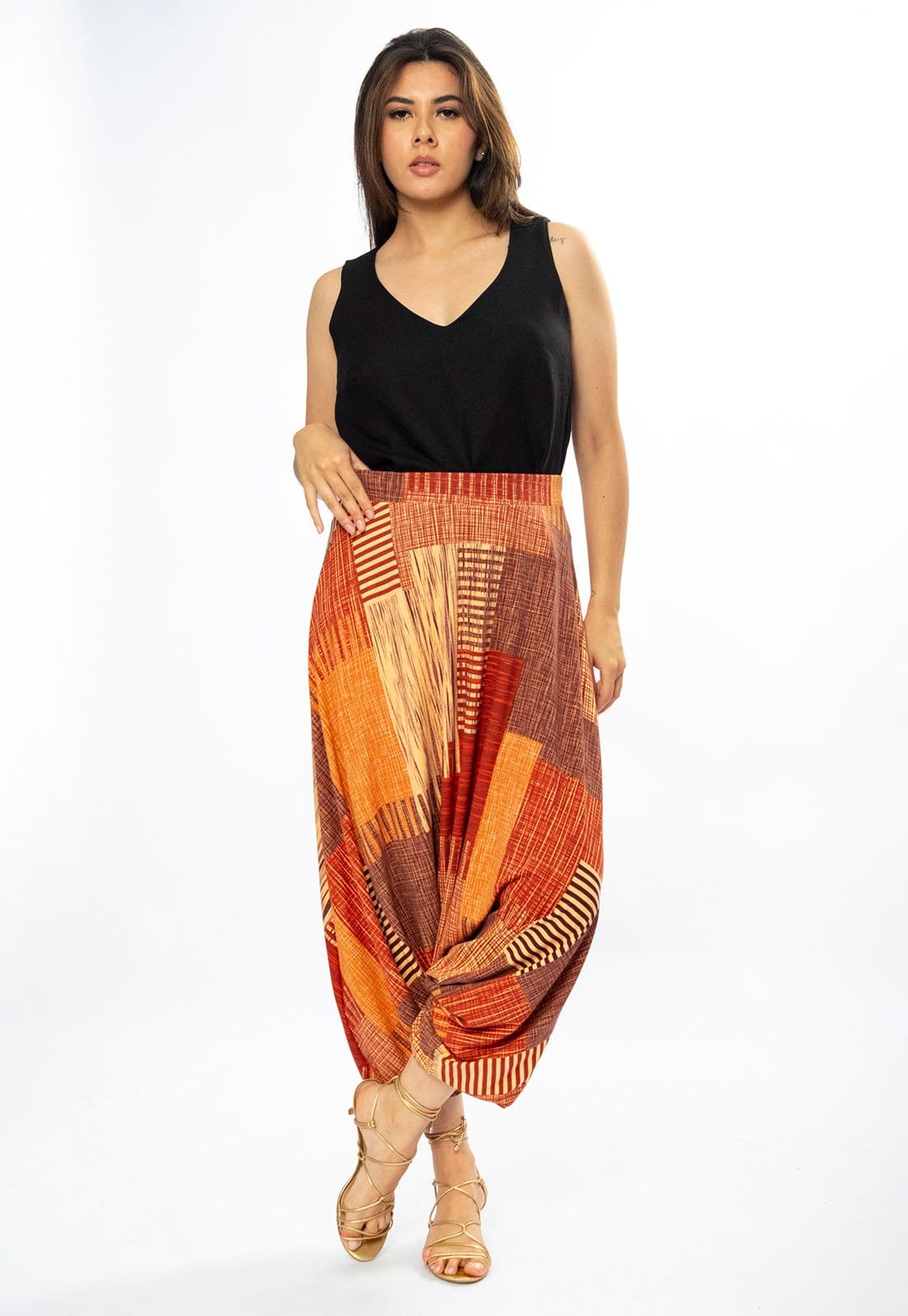 Vista principal Calça Saruel Amazonia Vital Malha Tramas do Sol Amazonia Vital bege/estampado/laranja/vermelho