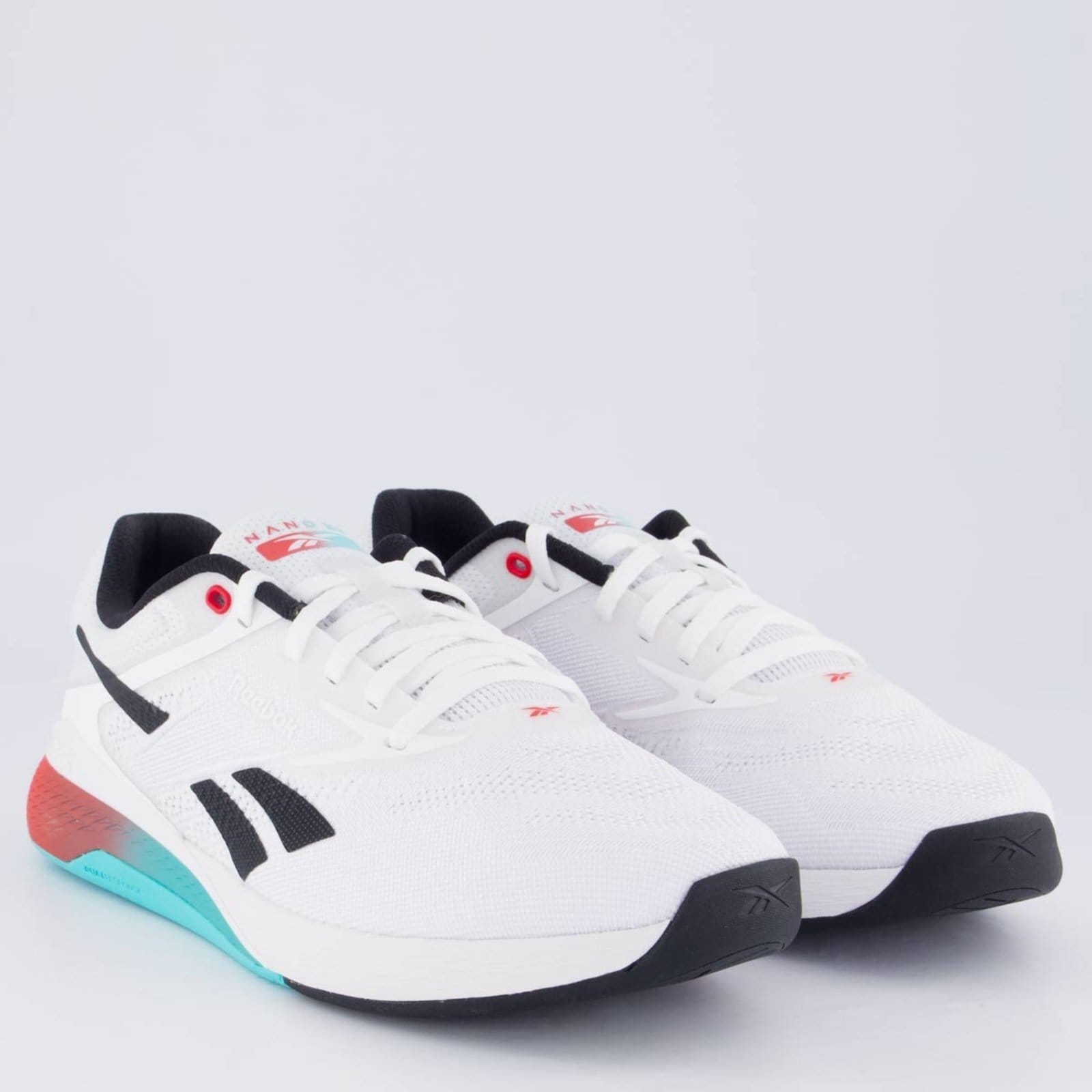 Vista 2 Tênis Reebok Nano X5 e Vermelho Reebok branco