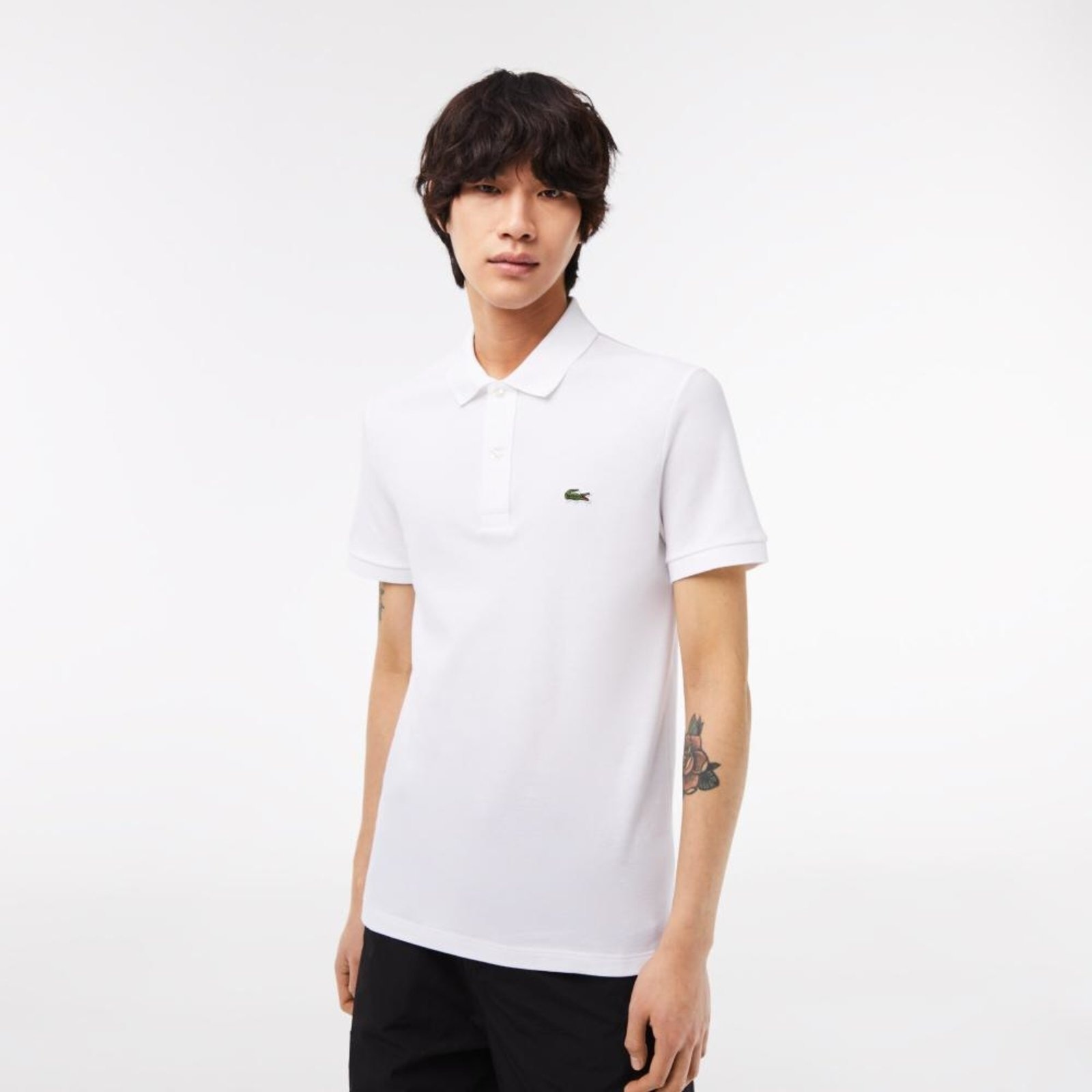 Imagem principal Camisa Polo masculina Slim Fit em petit piquet Lacoste branco