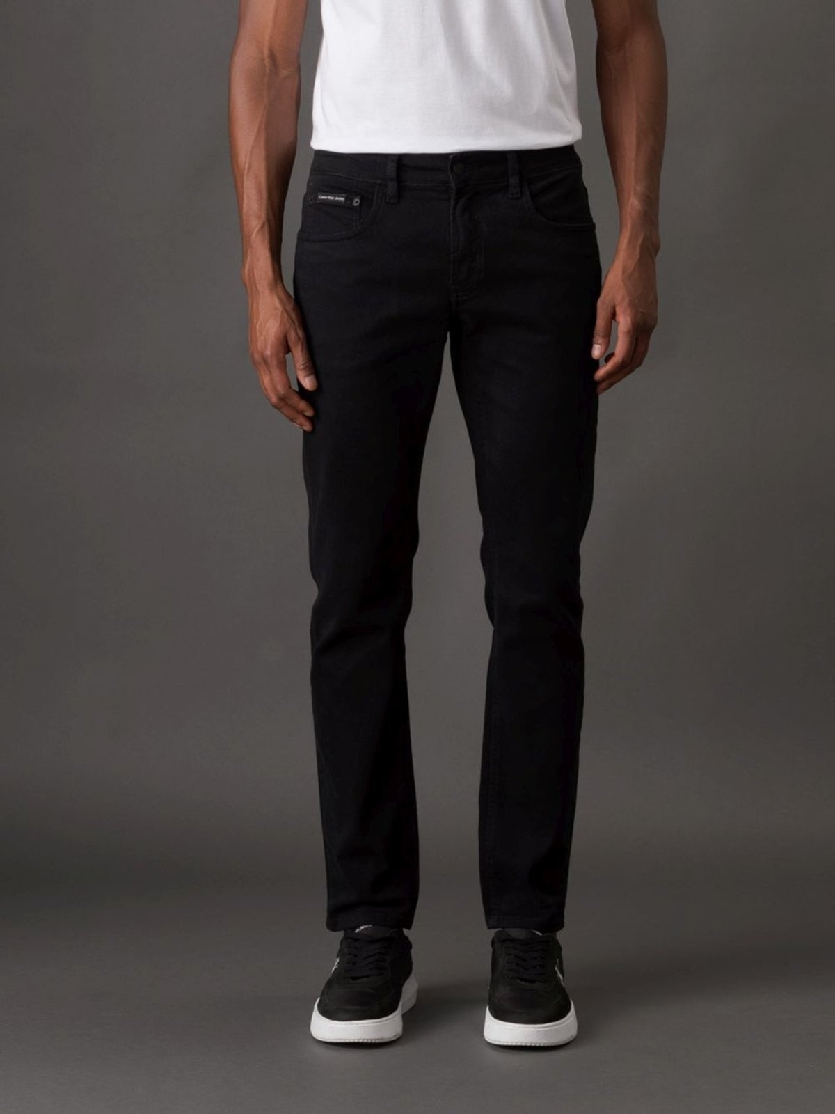 Imagem principal Calça Masculina Color de Sarja Infinite Black Skinny Cintura Baixa Calvin Klein Jeans - Preto Calvin Klein Jeans preto black