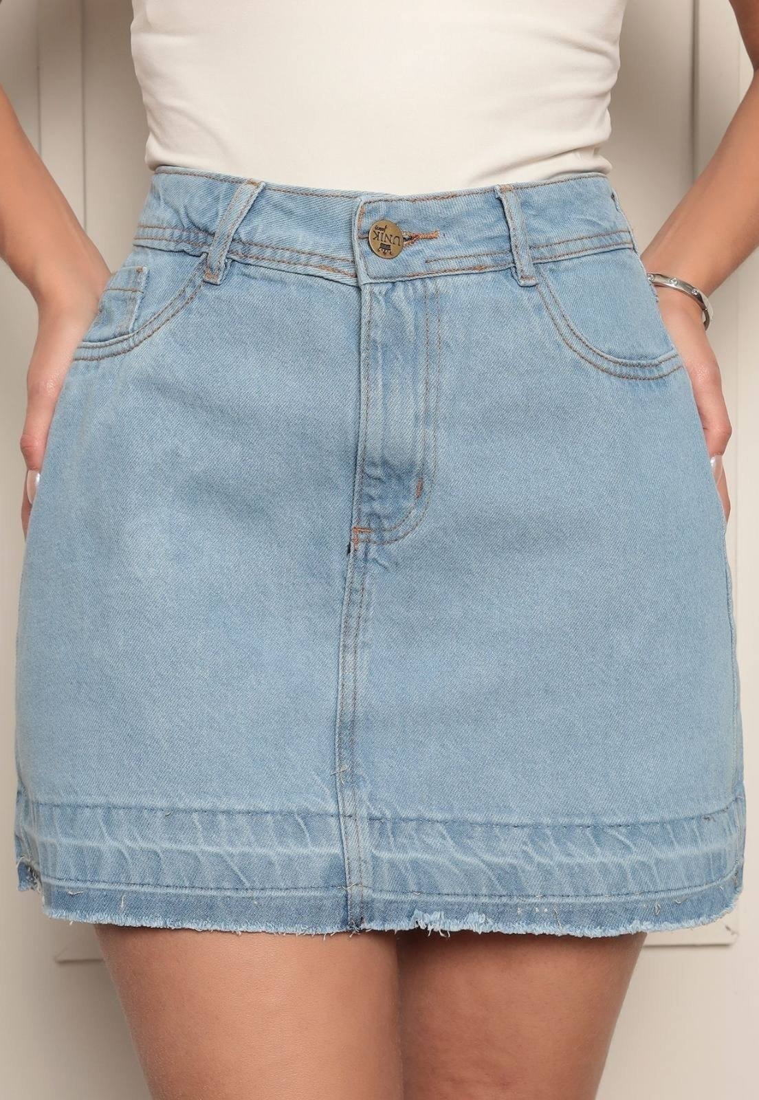 Imagem principal Saia Feminina Cintura Alta Ethereal Jeans Confortável e Estilosa Com Barra Lavagem Clara Ethereal Jeans azul